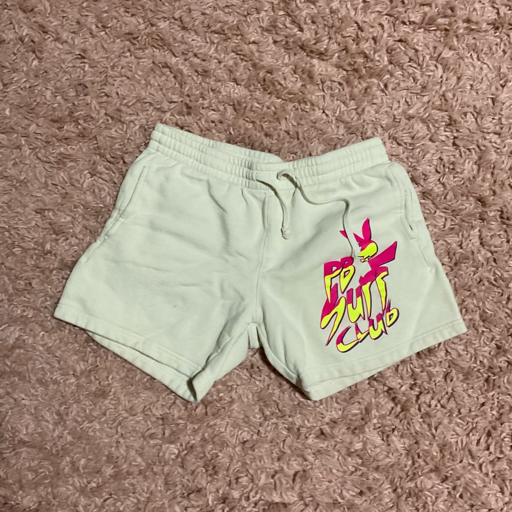 Hello! I am selling shorts with graphic lettering. It is white and yellow.